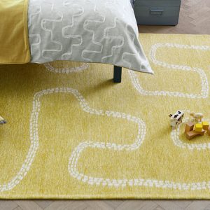 Pitter Patter Rug Sandpit in a room setting